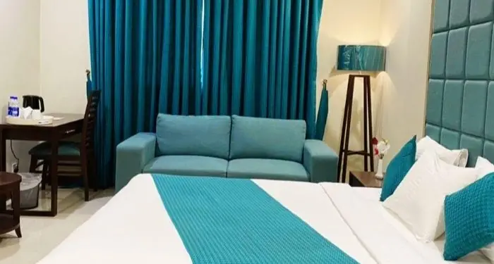 Atlas Hotel Deluxe Room Bed in Islamabad